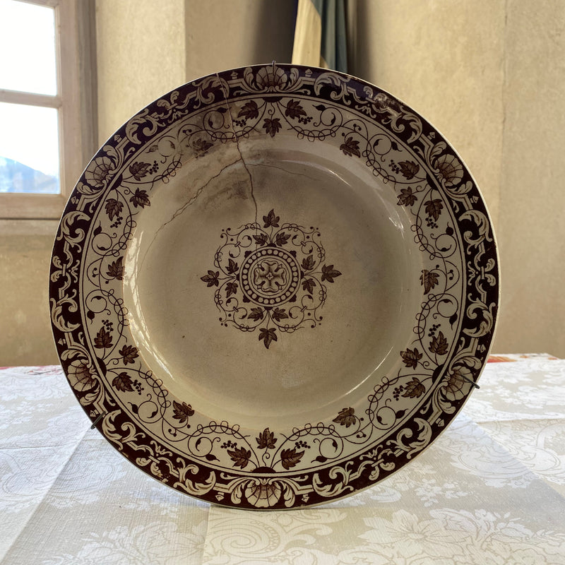 Antique deep porcelain plate